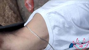 Young naughty boy gets milk splashed on face at the beach