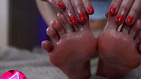 Sexy teen played with oiled feet close up