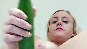 Blonde Milf Fucks Cucumber