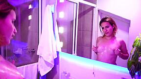 before shower this latina plays with soap and bubbles