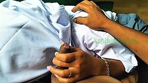 Asian couple practicing handjob techniques outdoors in a homemade video.