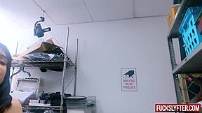 REPREssed thief hiding a perfume bottle in a drawer