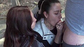 On our holiday, my neighbor and I sucked his big cock together in a public threesome