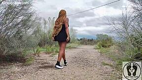 Ebony with big ass walks upskirt in sneakers.