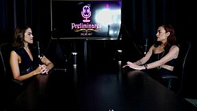 Kamilla Werneck demonstrates her blowjob and sucks Bia Hot's tits in sheer red lingerie