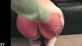 Zoe gets stripped and spanked over the knee in stockings