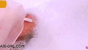 does the enchanting brunette enjoy her sensual bath?