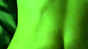 Young silly girl playfully fools around in the bedroom