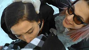 two hot girls warm a cock with blowjobs in the snow outdoors