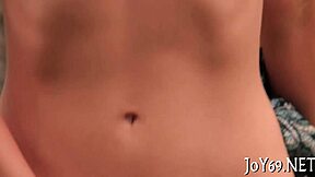 Playgirl achieves orgasm from solo play. Wet pussy glistens under touch.