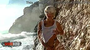 Is Petite Blonde Nicky Wayne Teasing by Removing Clothes on the Beach?