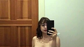 Cute teen strips and rips clothes to show shaved pussy