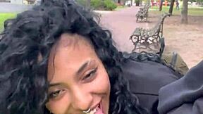 A person drinks milk in a public park in Buenos Aires during the day