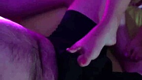 A petite cute girl gives a handjob over underwear, leading to orgasm