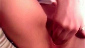 Teen hints at orgasm while fingering on webcam