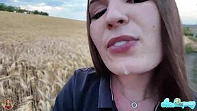 Brunette exhibitionist flashes tits for blowjob in wheat field
