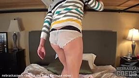 College girl films herself masturbating on the bed