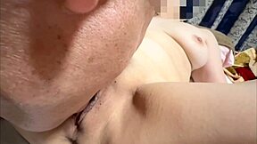Amateur couple licks shaved pussy close up post-virginity.