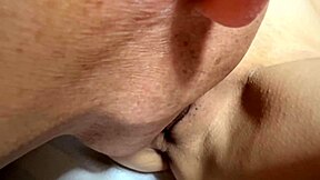 Amateur couple licks shaved pussy close up post-virginity.