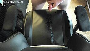 In the bedroom, the redhead teen masturbates her huge cock for a massive cum spray