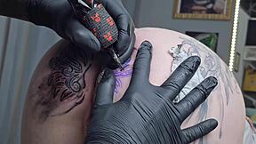 Starting my day with a new anal tattoo, then spreading for huge black cock