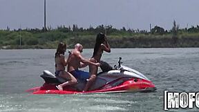Hot threesome sucking cocks on the seadoo outdoors