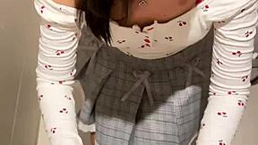 18-year-old asian girl gives blowjob in public restroom, ending with huge cumshot on her face