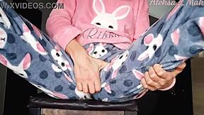 skinny teen stepdaughter teases in pajamas at home.