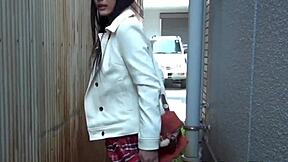 Asian babe flashes her undies in public outdoor