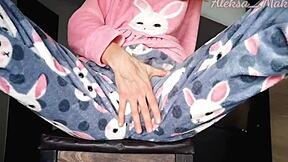 skinny teen stepdaughter teases in pajamas at home.