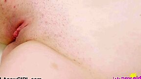 Radiant Blonde Beauty Receives Lesbian Massage on Sofa