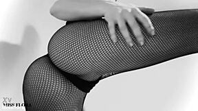 petite german brunette teases in fishnet tights and leggings