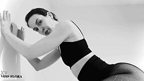 petite german brunette teases in fishnet tights and leggings