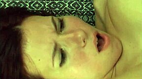 A redhead amateur feels intense pleasure as cum lands on her big tits in the shower