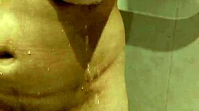 My step sister allows me to watch her shower, enjoying the voyeur attention.