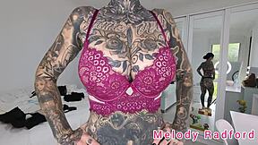 Melody Radford tries on black and purple lingerie and micro bikini in detailed haul