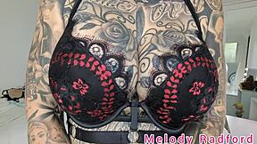 Melody Radford tries on black and purple lingerie and micro bikini in detailed haul