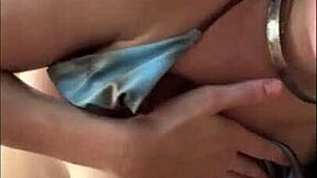 Horny teen in bikini gives oily titjob on public beach