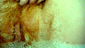 annie enjoys a comfy bubble bath with her body and monster toys