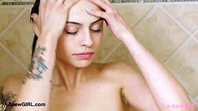 petite brunette model enjoys sensual shower