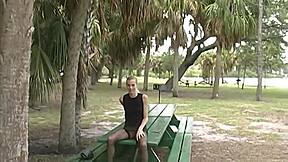 Mindy flashes her small tits outdoors for monster cock