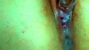 Girl's puffy pussy meets glass dildo for sensual orgasm