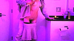 Teen feels intense pleasure in club toilet.