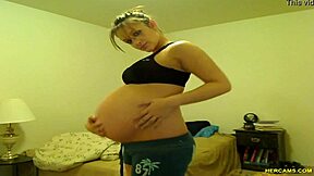 What happens when horny teen slut Tori Taylor teases with big tits and masturbates in blue shorts on webcam?