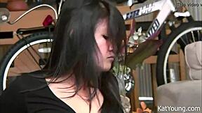 is kat young the sexy asian teen teasing in her black dress and thong while dancing provocatively?