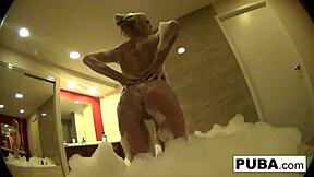 Can Elsa Jean tempt you with her hotel room and exposed pussy display?