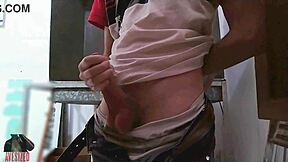 Skinny guy masturbates with big cock in shop backroom