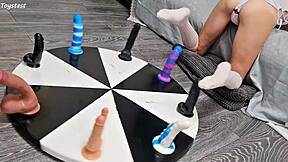 i love how my petite stepsister earns her orgasm with that wheel of dildos game
