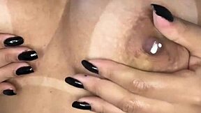 The Brazilian housewife casually showed off her lactating big natural tits to everyone around.