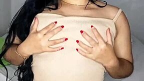 latina babe with big natural tits and long hair fingers her creamy pussy to orgasm